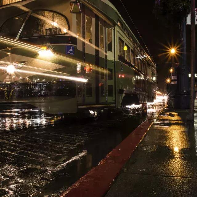 Streetcar at night in the rain